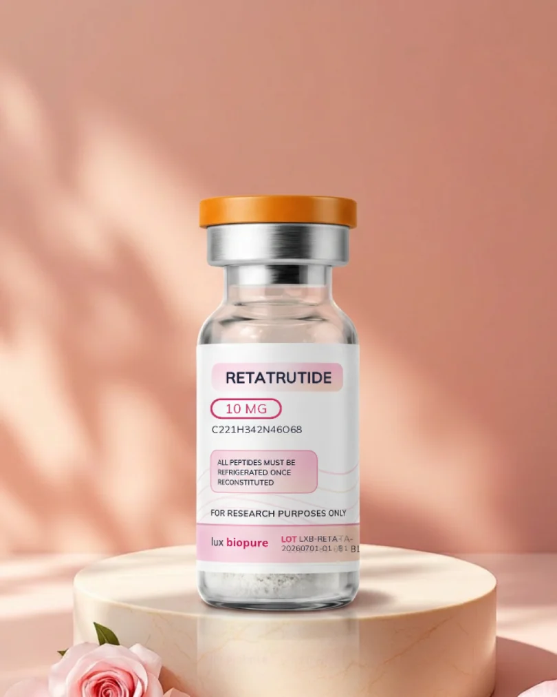 Retatrutide 10mg vial upright on a stone riser, label legible